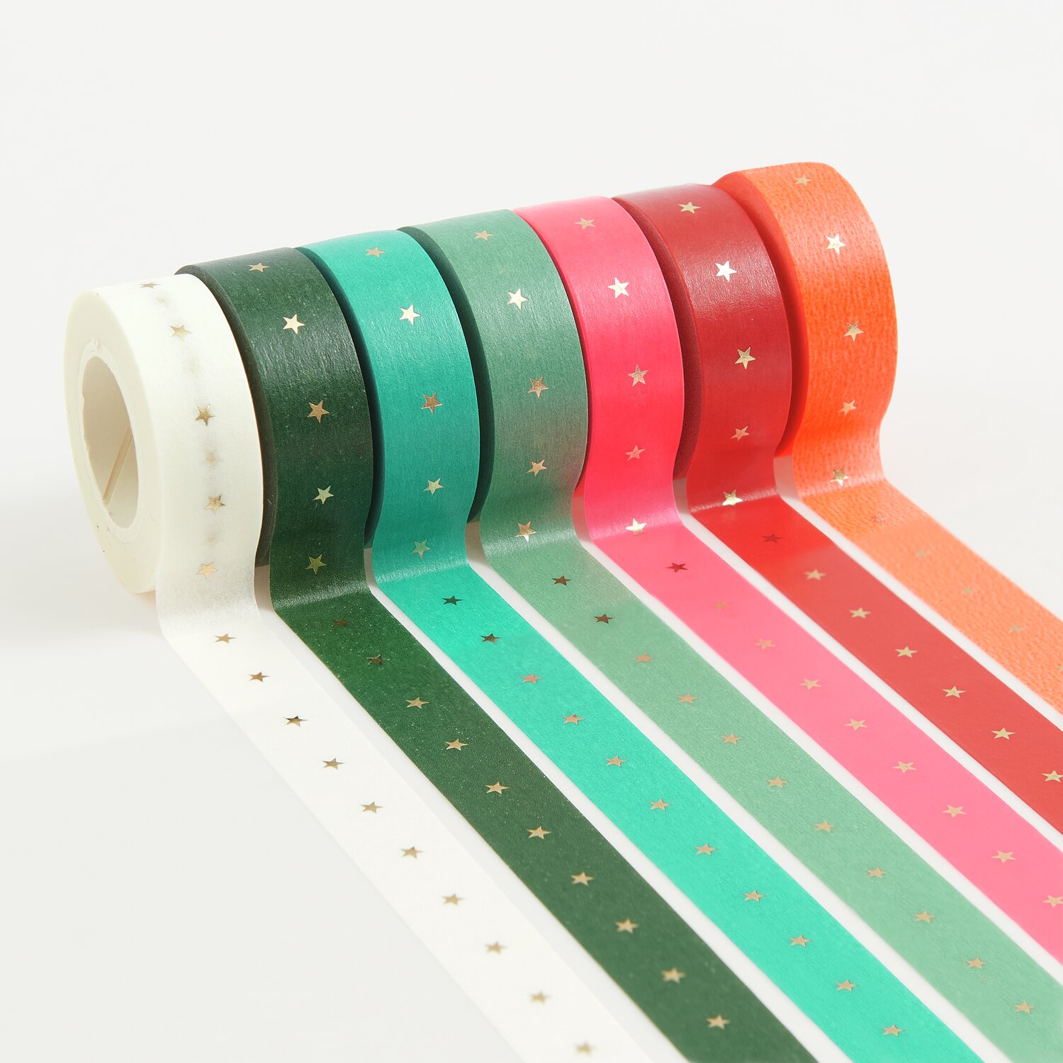 Paper Poetry Tape Set XXL Sterne, 7-teilig, zeigt bunte Klebebänder mit goldenen Sternen. Ideal für kreative Bastelprojekte.