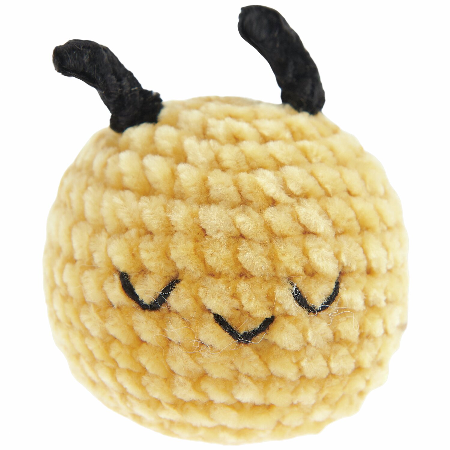 Ricorumi Nilli Nilli, ein gestricktes, senffarbenes Kuscheltier mit schwarzen Details. Ideal für kreative Handarbeiten.