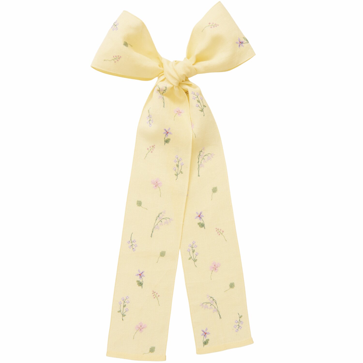 Stickpackung Gezählter Kreuzstich Schleife Wiesenblumen auf hellgelbem Stoff, 30x54cm, mit zarten Blumenmustern.