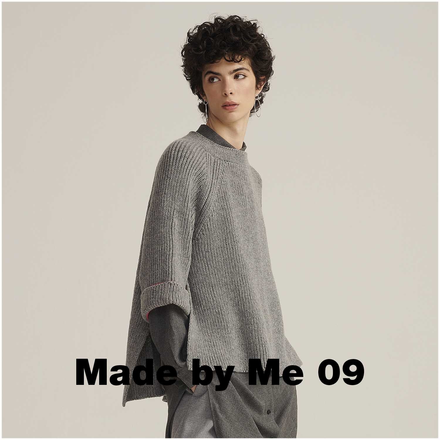 Luxury Super 100 Superfine Wool dk 50g 165m Farbe Grau von Rico Design Luxury Super 100 Superfine Wool dk: Person in grauem Strickpullover von Rico Design, elegant und stilvoll.