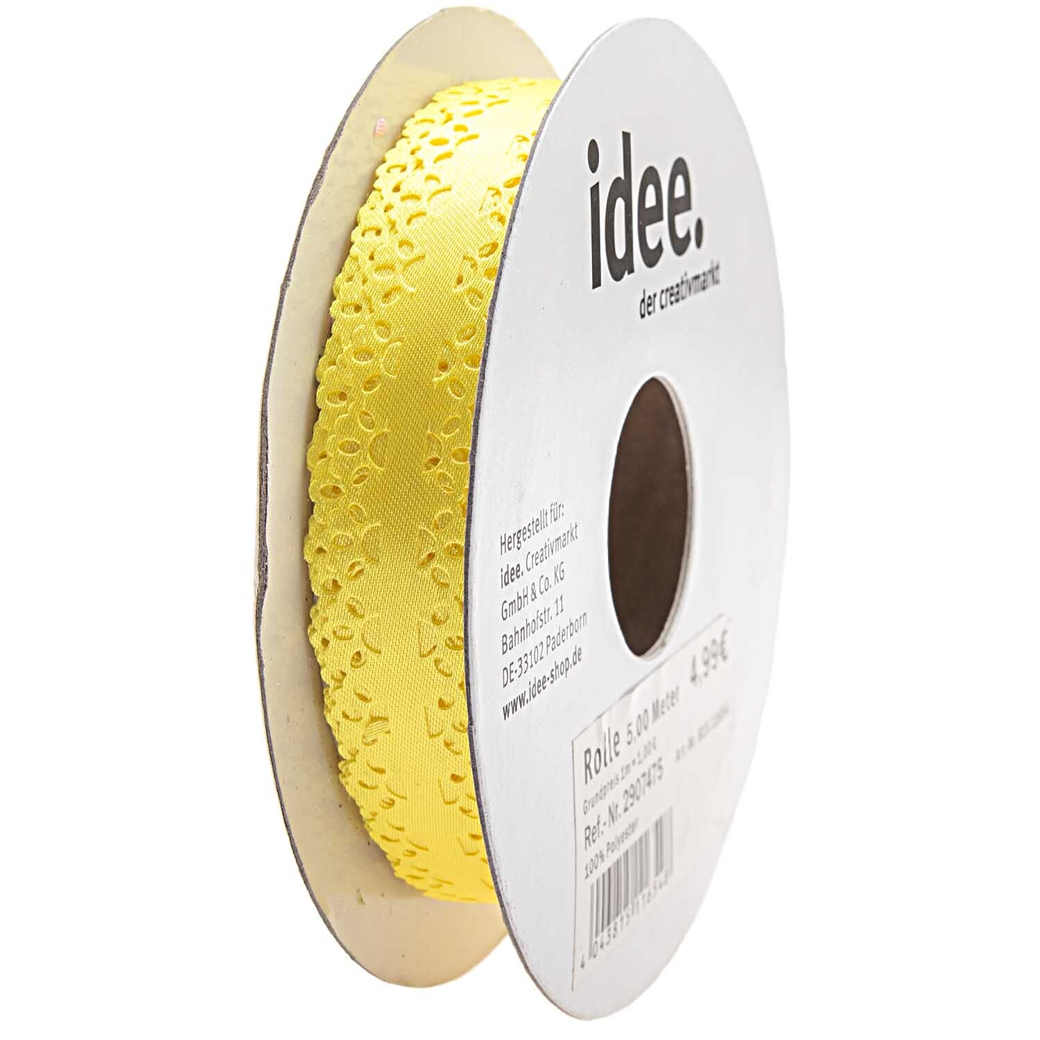 Band Bordüre 15mm 5m: Gelbes Band auf Rolle mit feinem Muster, von idee. Creativmarkt. Ideal für Dekorationen.