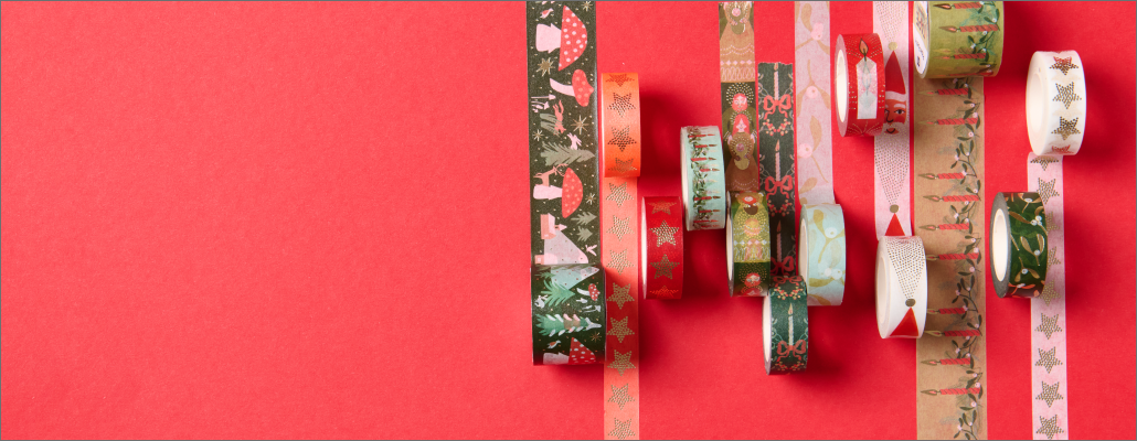 Weihnachtliche Washi Tapes mit Sternen, Kerzen, Wichteln und Wintermotiven.