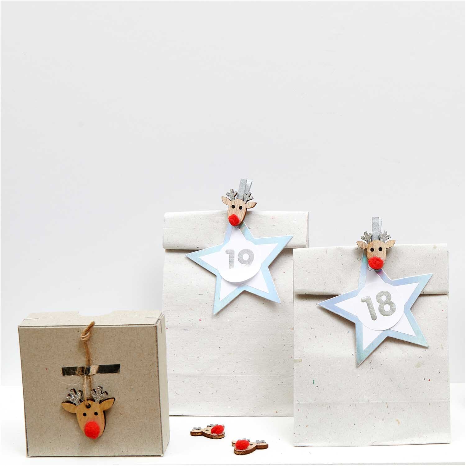 Dekoklammern mit Glitter Rentier 3cm 8 Stück Dekoklammern mit Glitter Rentier 3cm 8 Stück