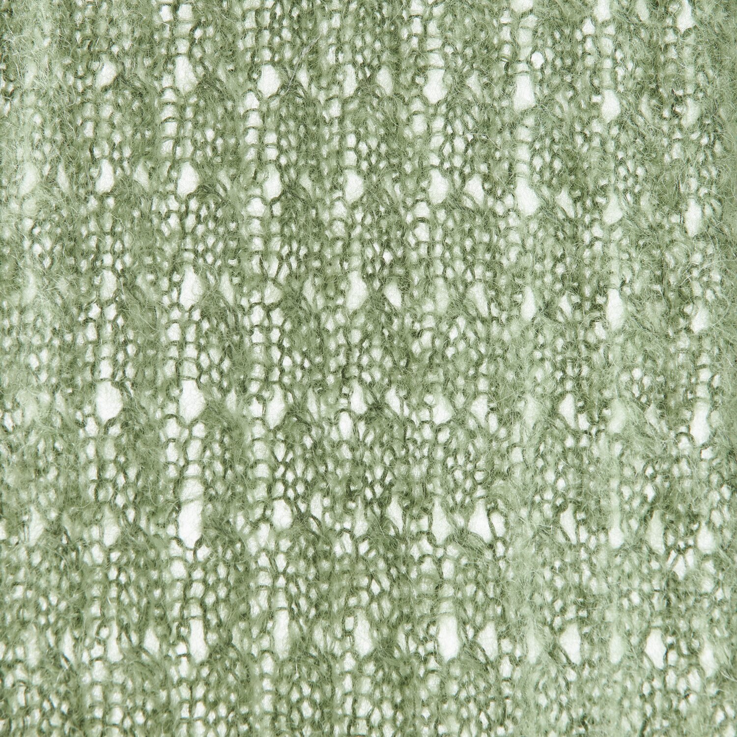Lovewool No. 21 Herbst-Winter Sprachauswahl deutsch von Rico Design Ein gestricktes Textilmuster in zartem Grün, das die feine Struktur und das Design des Stoffes zeigt. Ideal für Modeprojekte, die Eleganz und Stil betonen.