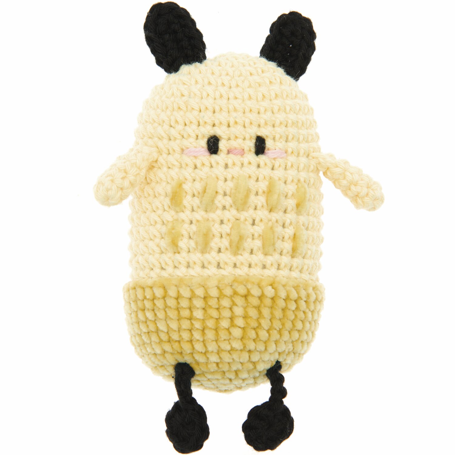Ricorumi Nilli Nilli, ein gehäkeltes Spielzeug in Vanille mit schwarzen Details, ideal für kreative Projekte.