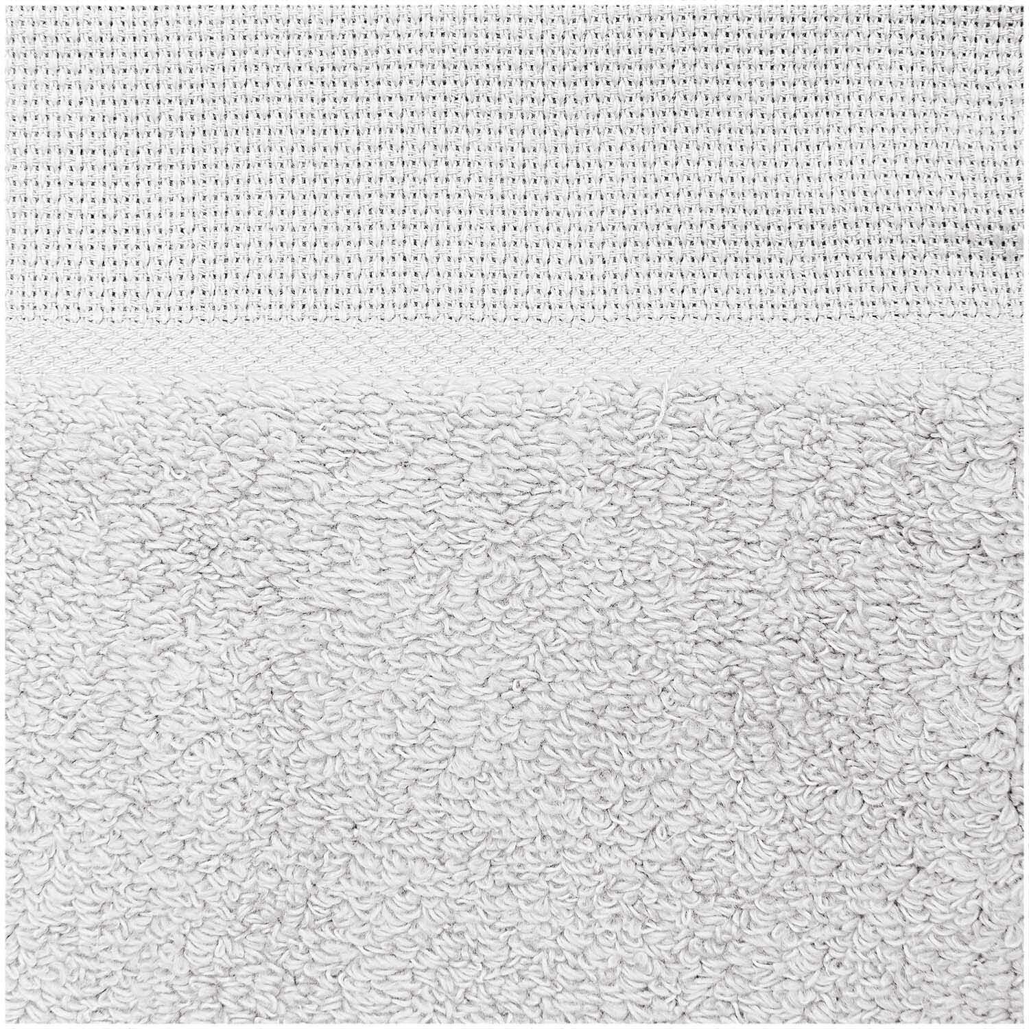 Lätzchen 30x34cm von Rico Design in neutralem Ton, zeigt weiche Textur und feines Gewebe. Ideal für Babys.