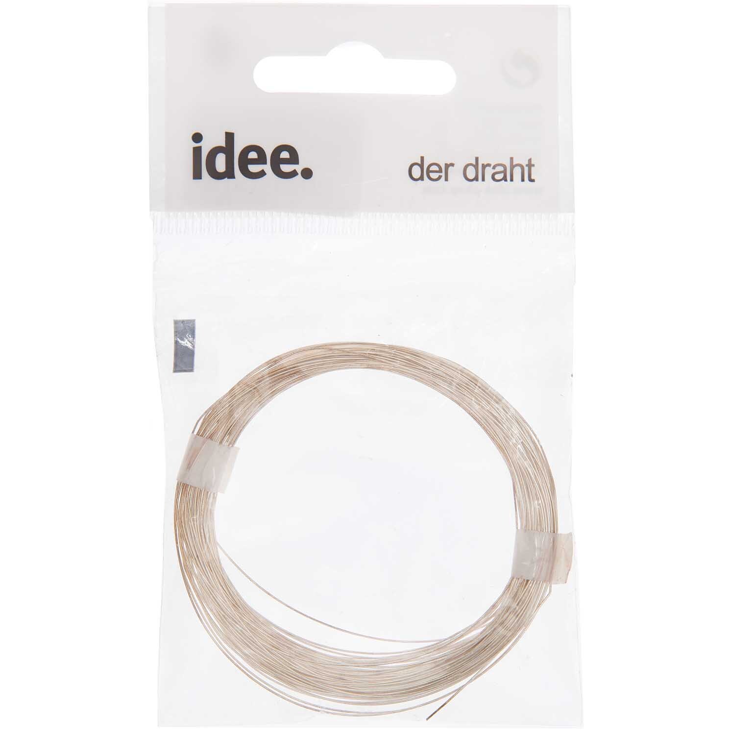 Silberdraht von preissler in einer transparenten Verpackung mit der Aufschrift "idee. der draht". Ideal für kreative Bastelprojekte.