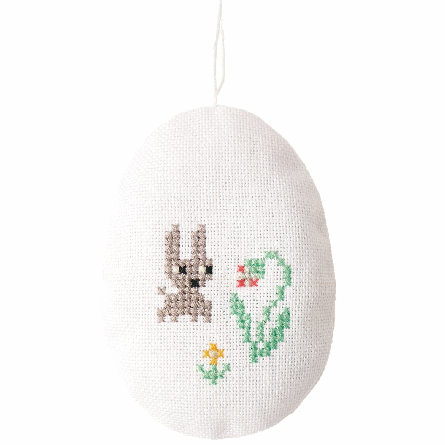 Stickbuch Futschikato 183: Weißes Stickei mit Hase und Blume, ideal für kreative Osterdekorationen.