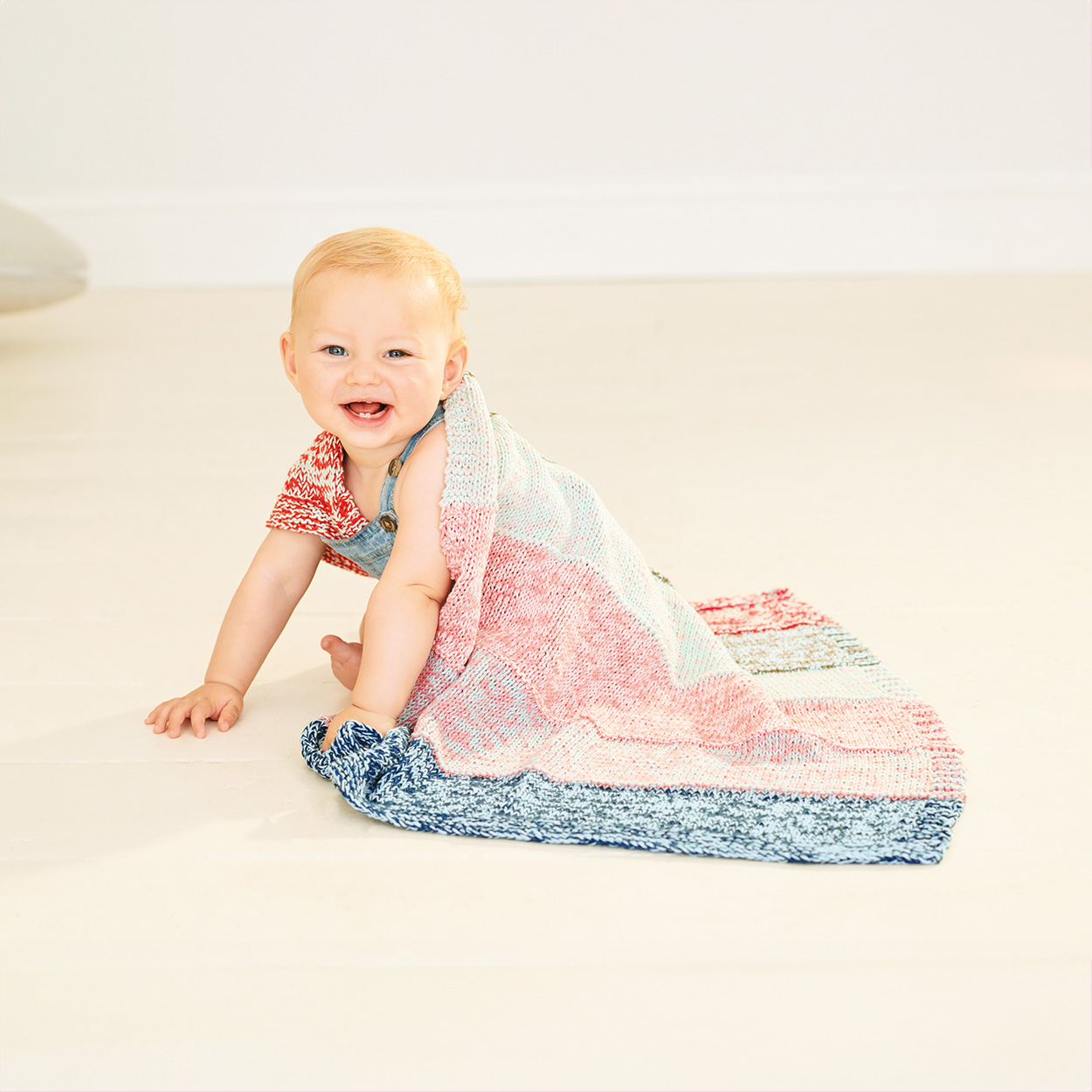 Geburt_Taufe_Stricken_fürs_Baby Wolldecke bunt gestreift
