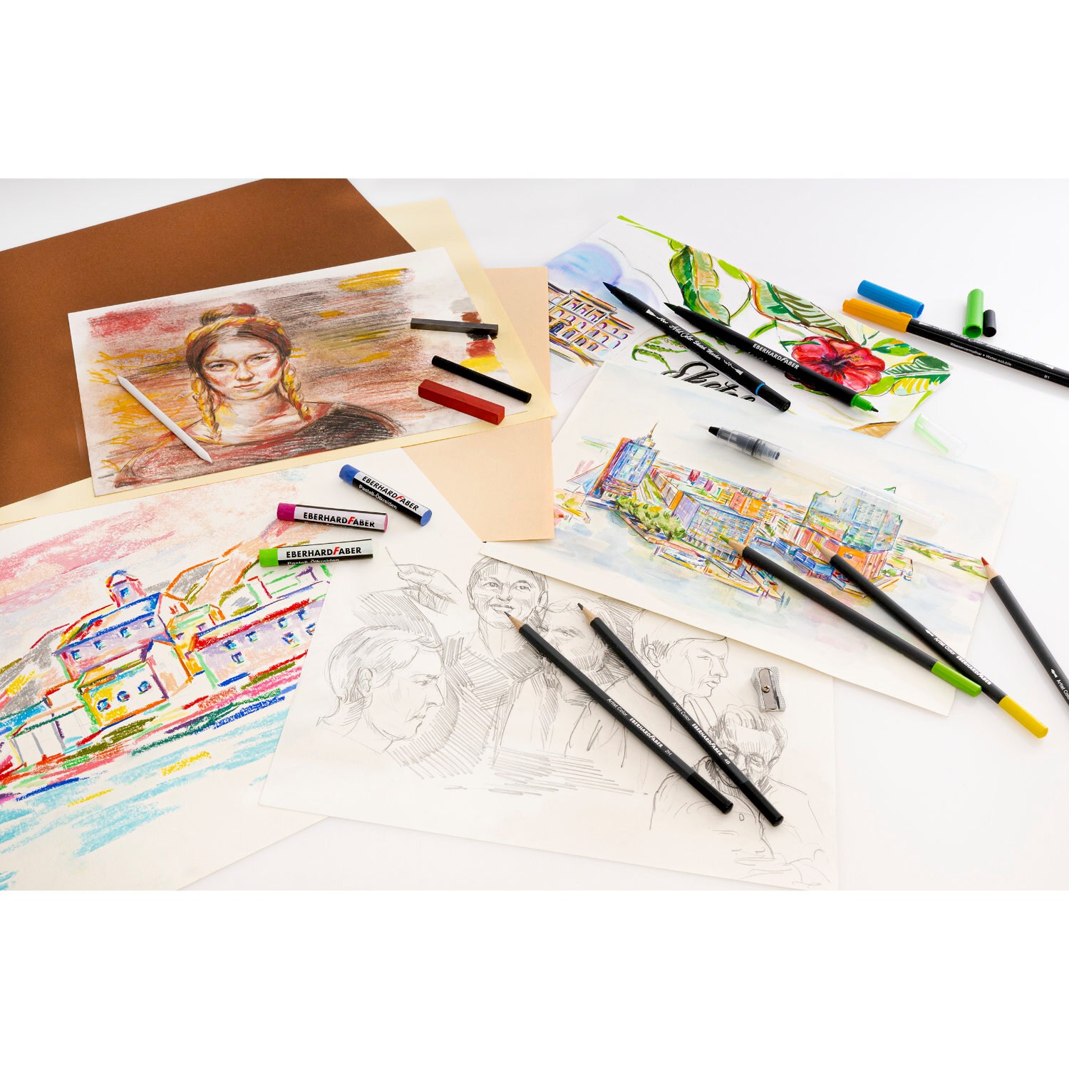 Artist Color Ölpastellkreide, 50-teilig, zeigt bunte Zeichnungen und Stifte auf einem Tisch.