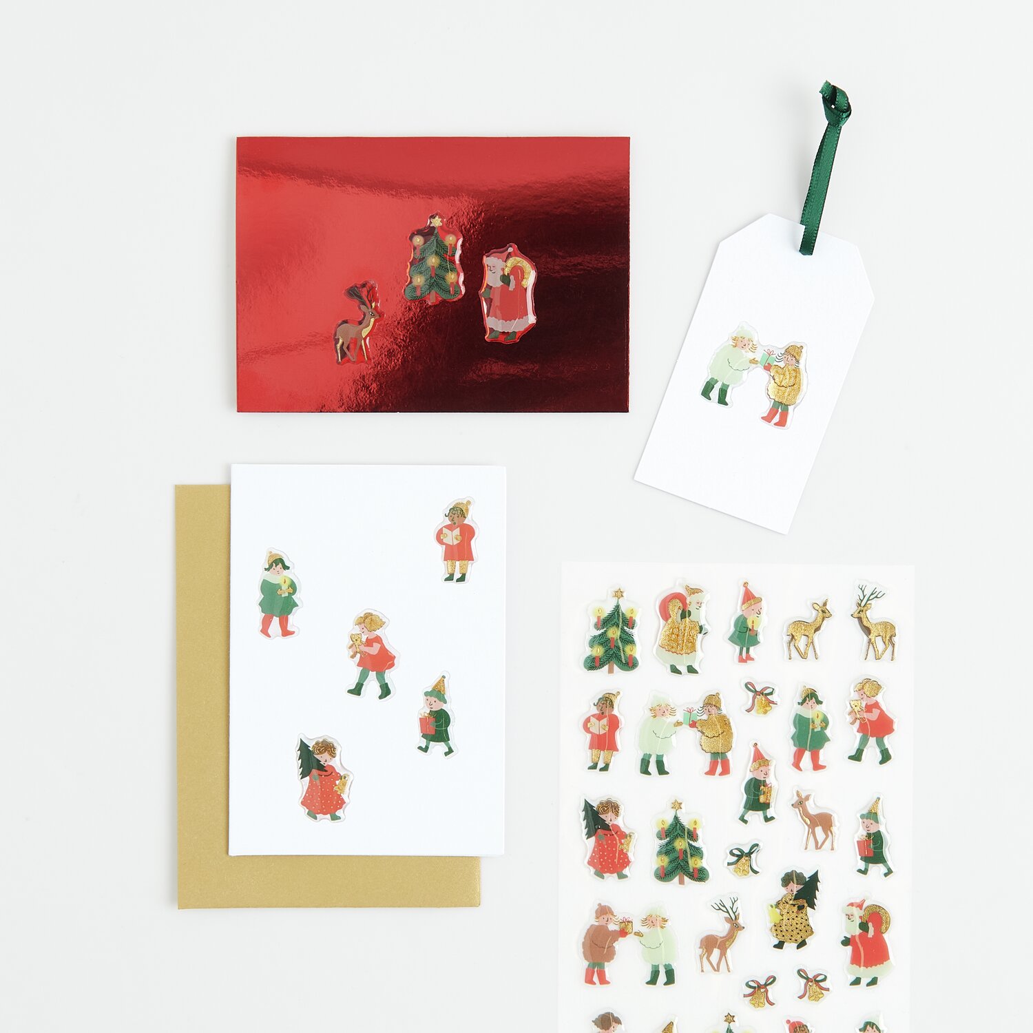 Paper Peotry Gelsticker Kinder 1 Bogen zeigt bunte Weihnachtsmotive auf Karten und Etiketten.