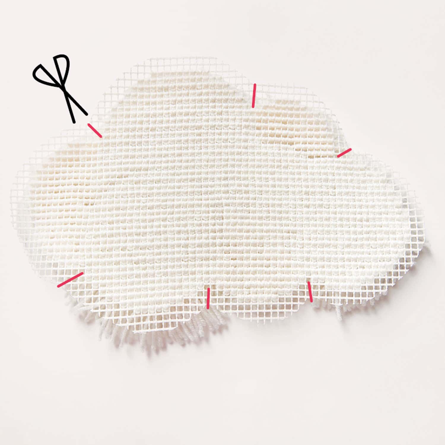 Rand einer Knüpffigur einschneiden