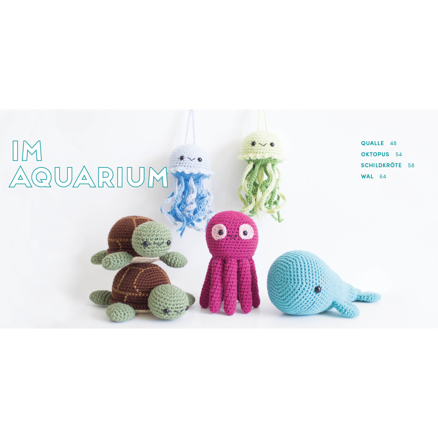Meine kunterbunte Amigurumi-Welt: Bunte gehäkelte Meerestiere wie Qualle, Oktopus und Wal.