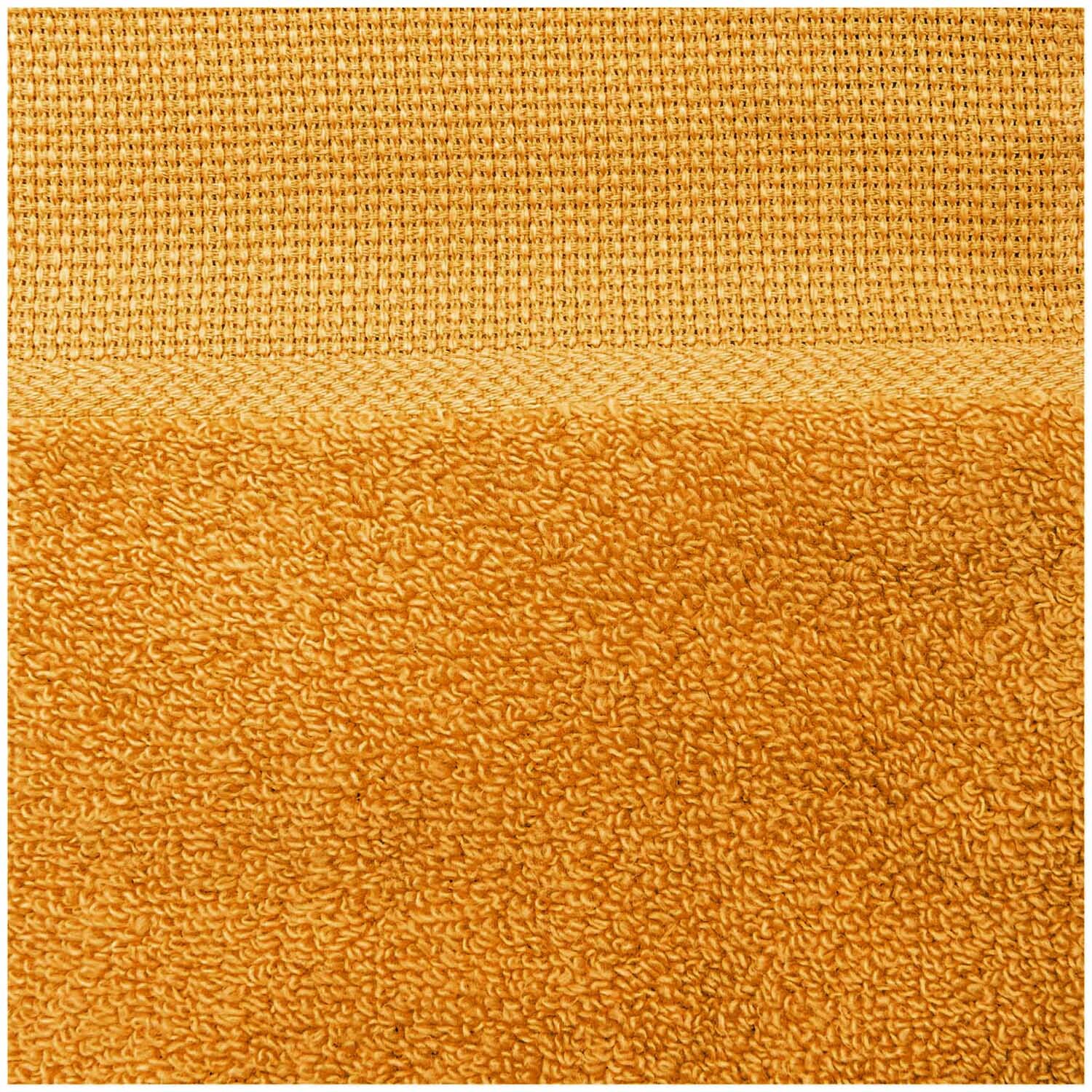 Gästehandtuch 30x50cm von Rico Design in dunklem Senf. Weiches Material, ideal für Badezimmer.