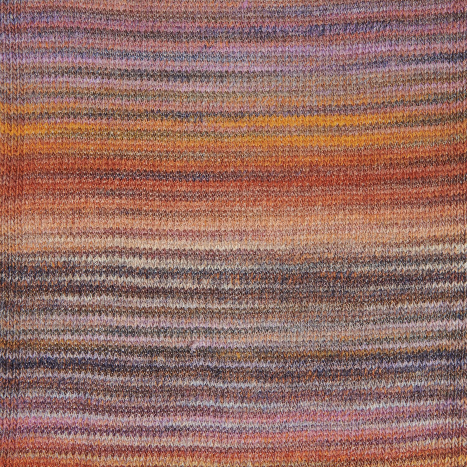 Creative Melange aran Wonderball, gestricktes Muster in warmen Erdtönen, 200g 640m.