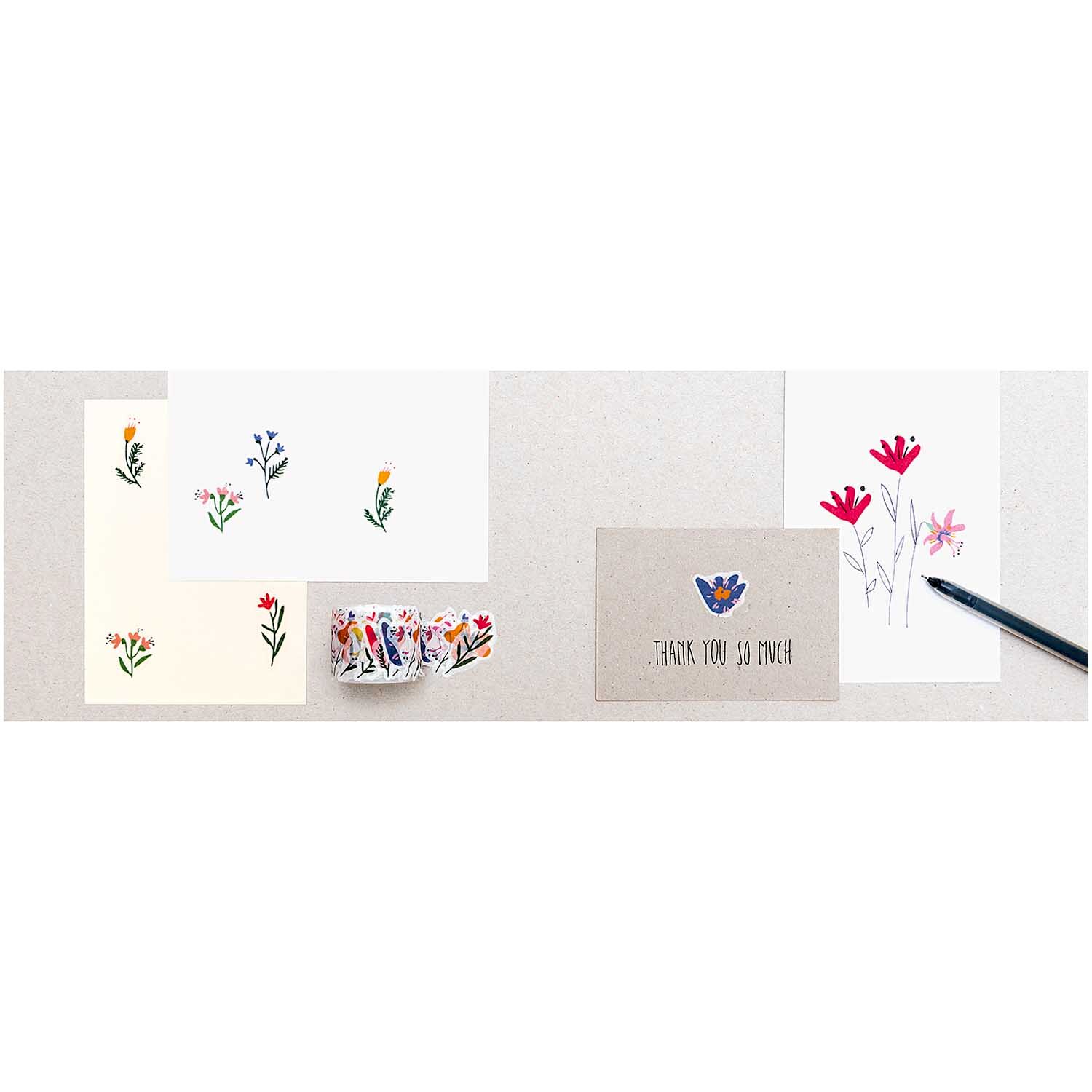 Washi Sticker Streublumen 200 Stück: Mehrfarbige Blumensticker von Rico Design auf Karten und Papier.