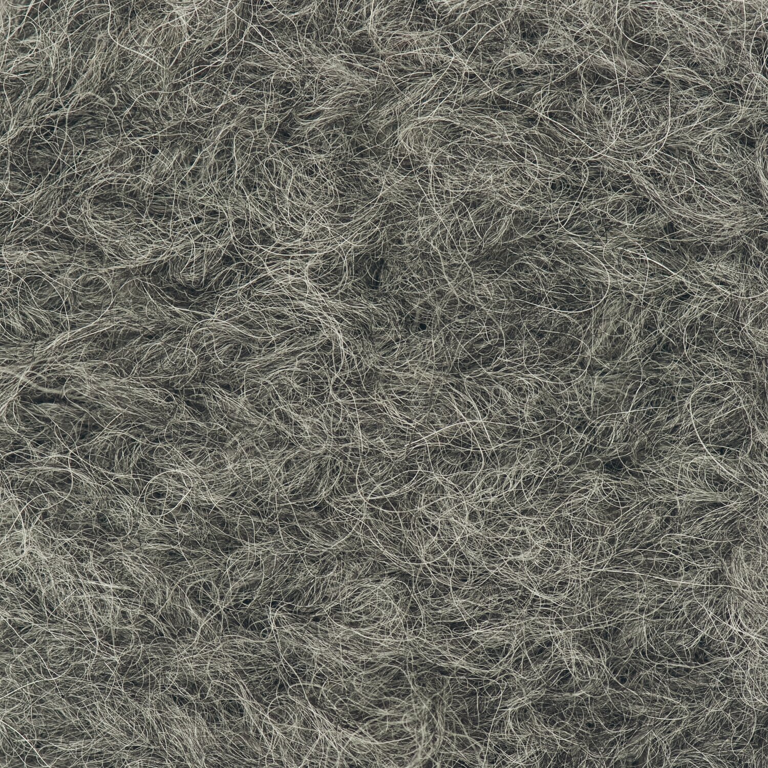 Fashion Light Luxury: Nahaufnahme von weichem, olivfarbenem Garn von Rico Design, ideal für Strickprojekte.