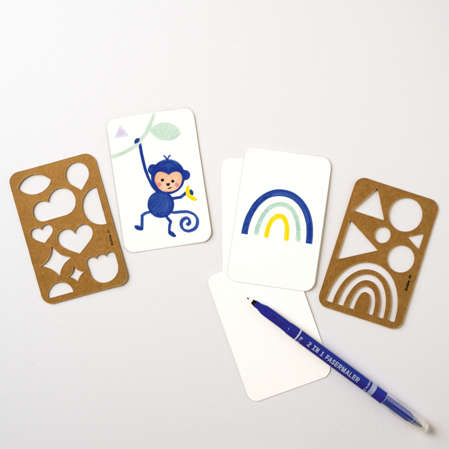 Spielkarten zum Gestalten 6,5x10cm, 36 Stück, mit Schablonen und Stift, ideal für kreative Designs.