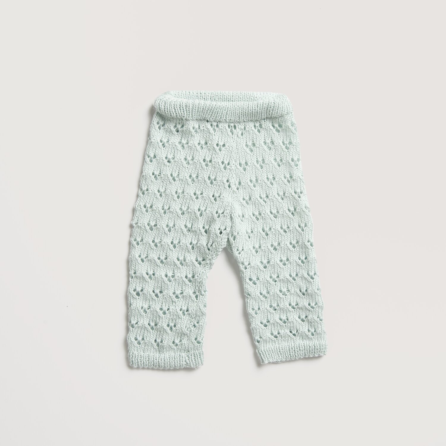 Baby Cozy Organic Cotton Cashmere: Hellblaue Strickhose aus weichem Material, ideal für Babys. Perfekt für Komfort und Stil.