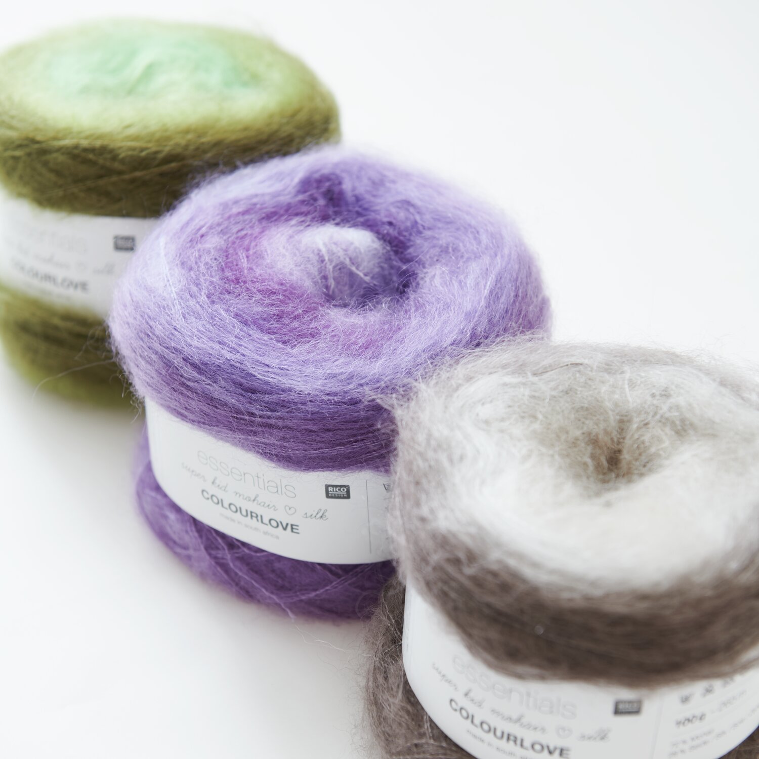 Essentials Super Kid Mohair Loves Silk Colourlove, weiche Garne in Violett, Moos und Kiesel, 100g 265m, von Rico Design.