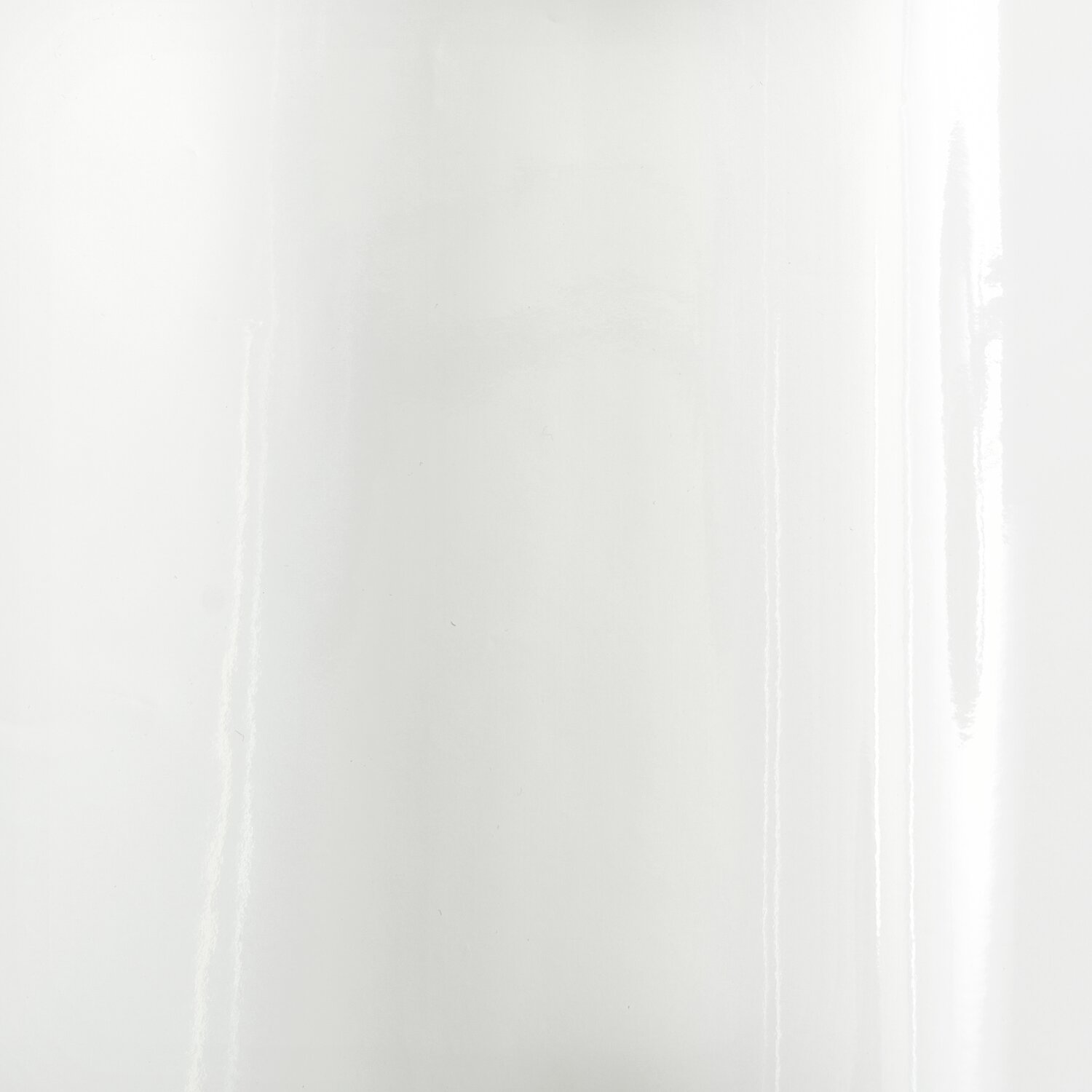 Geschenkpapier Lack 200x70cm zeigt glänzende weiße Oberfläche, ideal für stilvolle Verpackungen.
