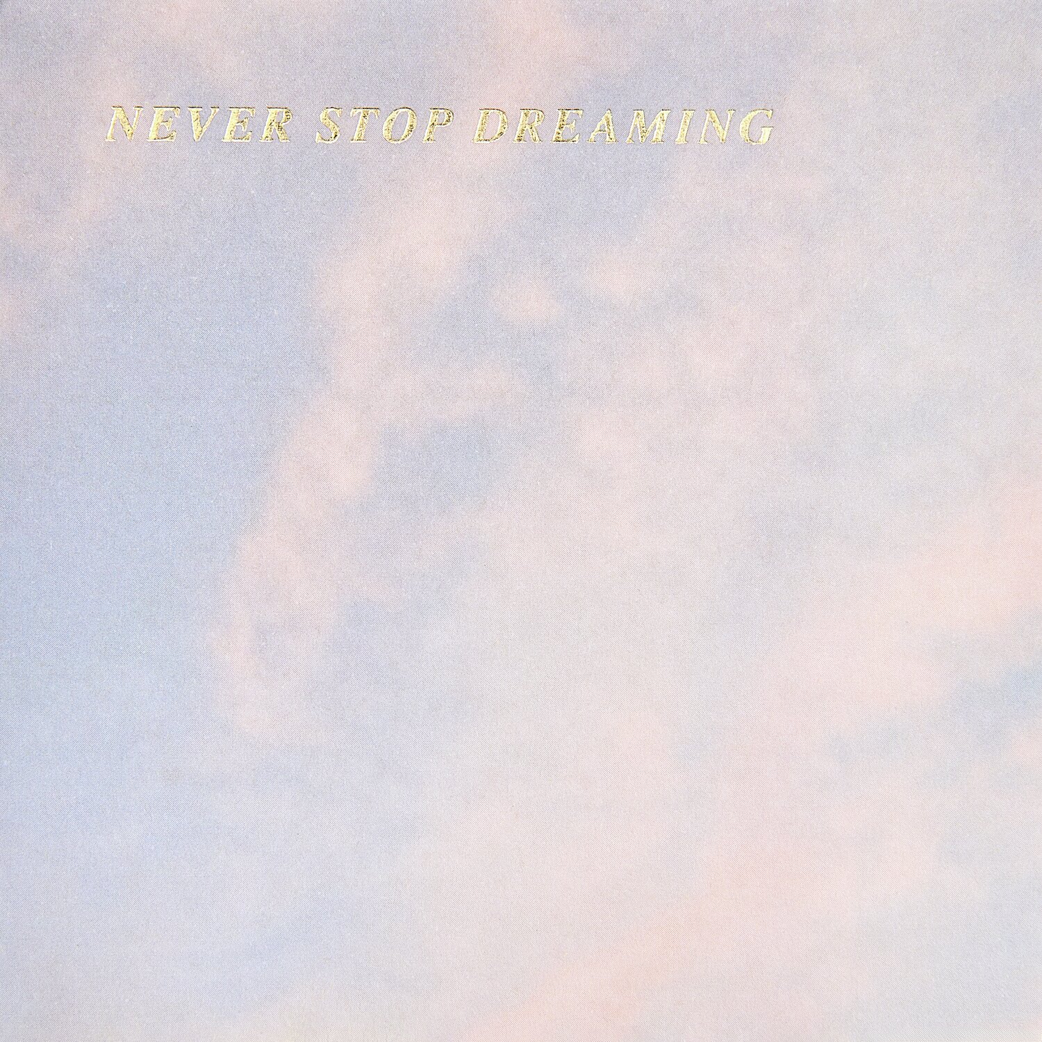 Paper Poetry Notizzettel-Box mit pastellfarbenem Himmel und goldener Aufschrift "Never Stop Dreaming".