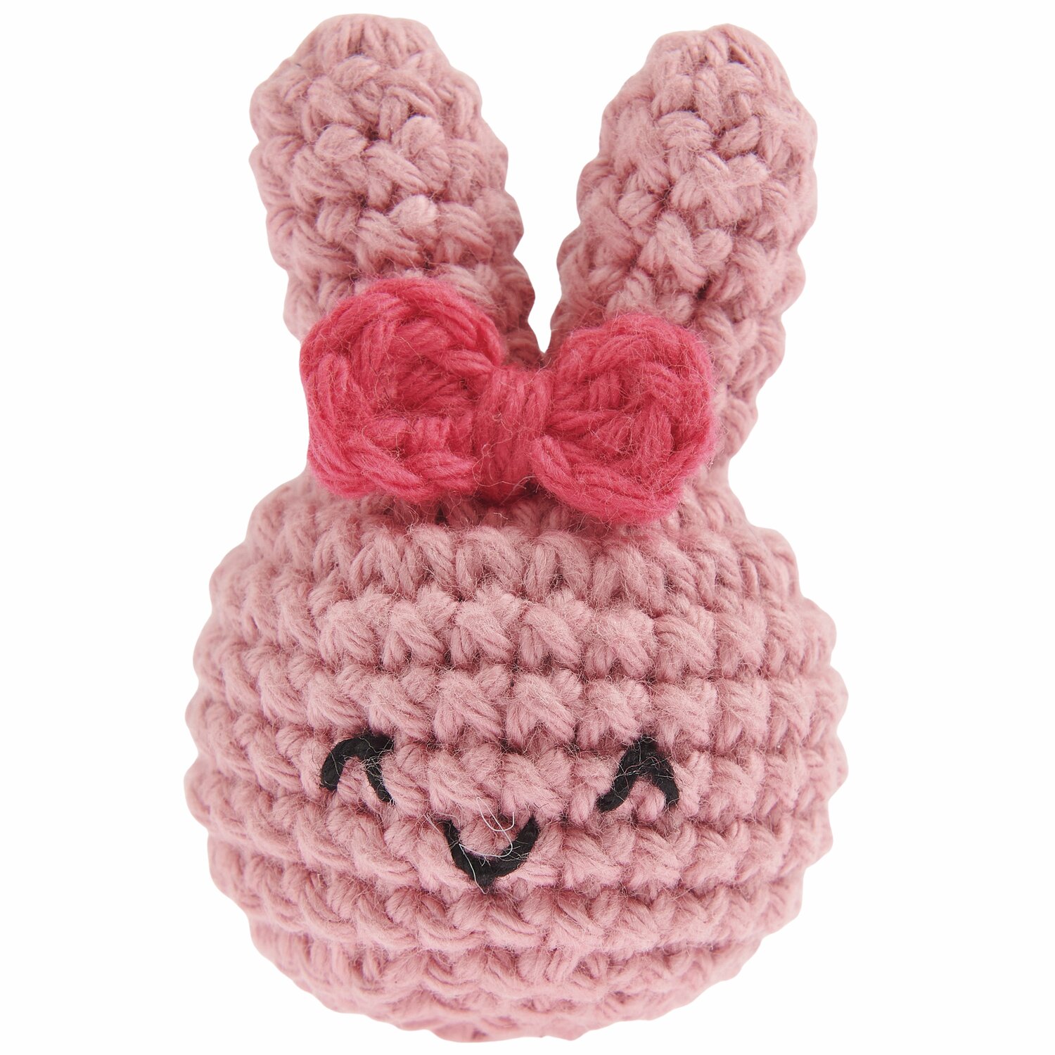 Ricorumi Rico Chingus, gehäkelter Hase in Altrosa mit Himbeer-Schleife, lächelndes Gesicht.