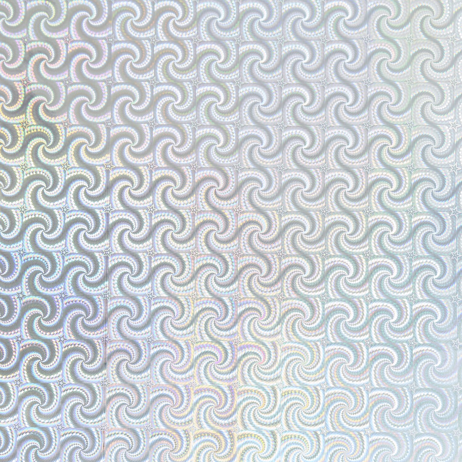 Paper Poetry Geschenkpapier mit holographischen Sternen in Silber von Rico Design, zeigt ein wirbelndes Muster. Ideal für festliche Anlässe.